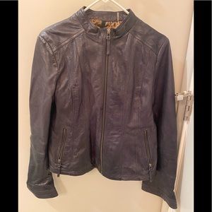 Wilson’s Black Rivet leather jacket